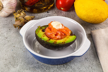 Whole grilled avocado with salmon