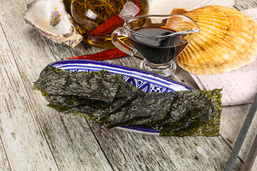 Green nori seaweed chips with soya sauce