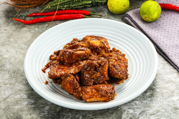 Indian cuisine - Vindaloo fish with spices