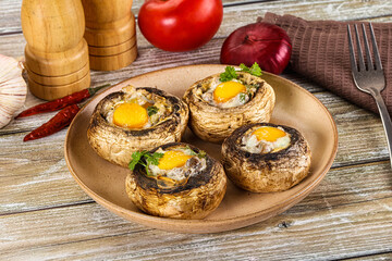 Baked champignon with quail egg