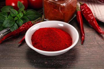Spicy dry paprika powder in the bowl