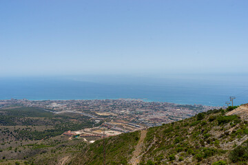 Fototapeta premium Panoramic View of Benalmádena Hills and Mediterranean Coastline in Málaga