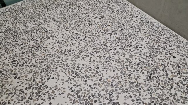 Initially, components such as polyester and vinyl ester resins were used as binder resins. Today, most terrazzo installed is based on epoxy terrazzo. Recycled aggregates used include glass, porcelain