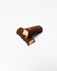 Slice of chocolate wafer. The taste is so sweet, pass for chill out and fulfilling. Isolated white background