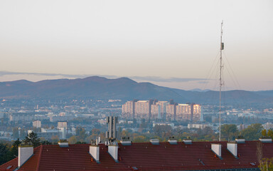 Vienna, Austria - October 29, 2024: Alt Erlaa residential park on a fall morning with reflections of the morning sun in the windows
