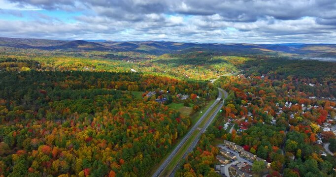 Amazing scenery of Vermont, New England, USA in autumn. Two parallel highways cross the wooded landscape. Aerial perspective.