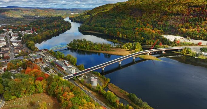 Bridges over the Connecticut river in Brattleboro, Vermont, New England, USA. Aerial perspective on the beautiful town in autumn.