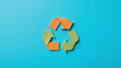 Blue backdrop with colorful recycling symbol showcasing eco-friendly modern aesthetic