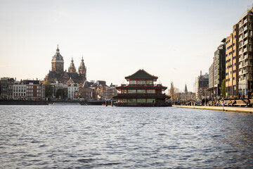 Fototapeta premium Cityscape of the beautiful city of Amsterdam seen from a boat 15