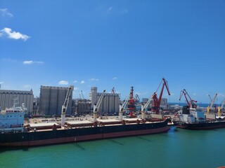 morocco casablanca apr 25 2024 Industrial Shipping Port With Large Cargo Ships and Cranes Under Blue Sky