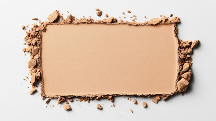 Top view of a rectangular beige cosmetic powder on white background with crumbled edges