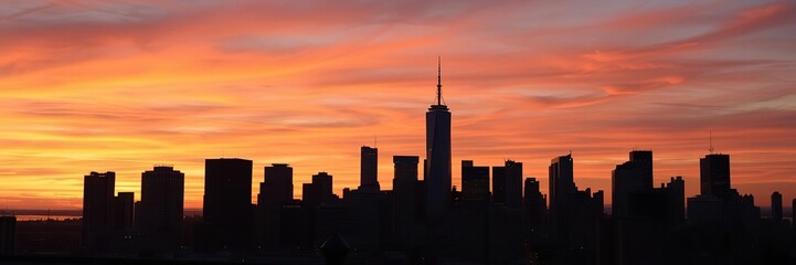 City skyline at sunset from a rooftop, city skylines, scenic vistaCity skyline at sunset from a rooftop, rooftop views