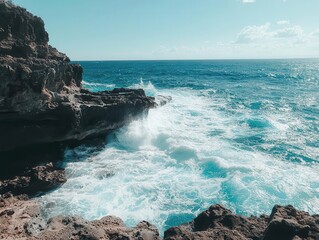 scenic rocky cove with a breathtaking view of the sea, waves crashing against the rocks under a clear blue sky, embodying the beauty and serenity of coastal landscapes