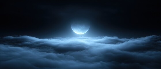 Obraz premium A large moon is shining through the clouds in the night sky