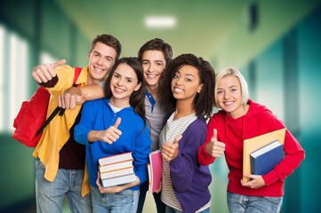 Fototapeta na wymiar Portrait of happy smiling students friends in international university.