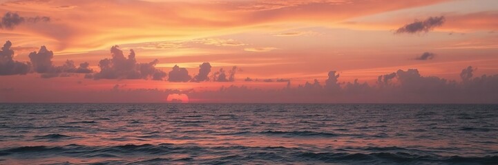 Fototapeta premium Vibrant and mesmerizing sunset casting hues of orange, pink, and purple over the tranquil ocean, ocean, dusk, picturesque
