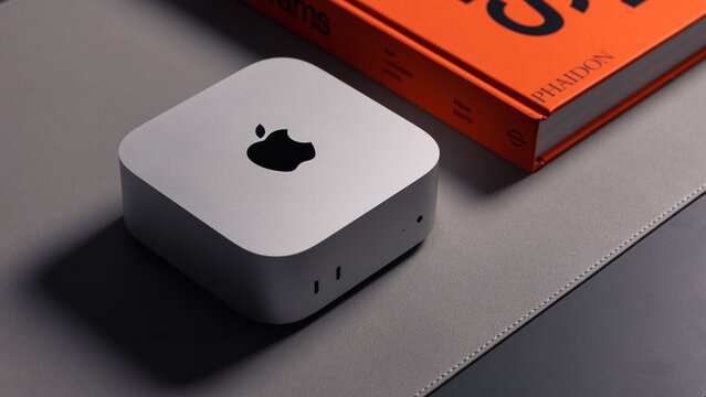 LONDON - NOVEMBER 08, 2024: Apple M4 Mac Mini desktop computer in silver with new design