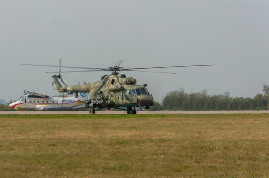 Most popular Soviet-Russian multi-purpose twin-engine helicopter Mi-8, Mi-17 (NATO - Hip) taxis through static parking lot. Helicopter close-up. MAKS-2015. Zhukovsky, Russia - August 26, 2015