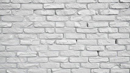 Fototapeta premium Weathered brick wall with grey, pebbled texture in a staggered pattern, reminiscent of vintage facades, textured background, rustic, grey brick texture