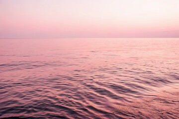 Obraz premium Gentle pink ripples in the sea create a soothing atmosphere, ripples, atmosphere, nature, peaceful, calming