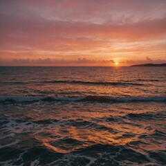Obraz premium A sunset over the ocean, with the sea turning orange and pink, contrasted by a white setting.