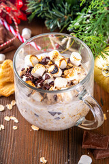 Overnight s`mores oatmeal, Christmas, winter holiday tasty breakfast healthy idea with oats, yogurt, marshmallow, chocolate and creamy sauce