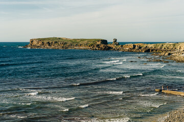 Rock formations of the Papoa island in the site of geological interest of the cliffs of the Peniche peninsula, portugal
