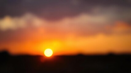 Fototapeta premium Warm glow of sunset fading into blurred background, soft illumination, natural ambiance, gradual fade