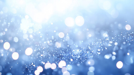 Obraz premium A bright abstract blue winter background with bokeh and snowflake