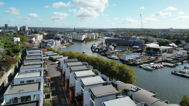 Aerial footage of the buildings straddling the River Avon in the city of Bristol in England, UK