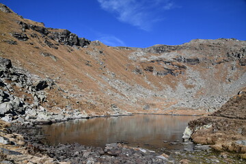 the lower Valfredda lake, a small body of water located in the Ayas Valley, above the Arp refuge.