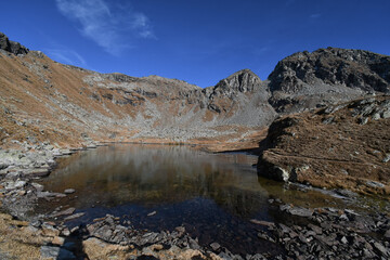 the lower Valfredda lake, a small body of water located in the Ayas Valley, above the Arp refuge.