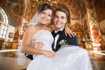 Fototapeta premium Happy wedding young couple bride and groom at wedding ceremony
