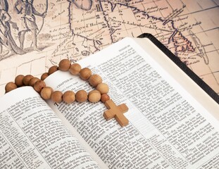 Holy cross, Bible book and world map