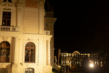 A captivating nighttime image that showcases the elegant beauty of historic buildings, all...