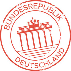 Red ink grunge rubber stamp depicting brandenburg gate, a famous landmark in berlin, germany, symbolizing travel, tourism, and german culture © Tartila