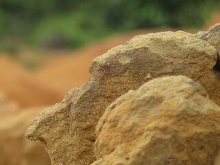 pile of small stones on a stretch of yellow earth
