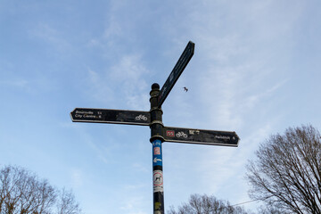 A signpost showing Birmingham Bournville to Redditch