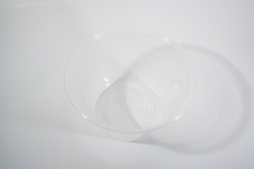Empty transparent plastic food container isolated on white background