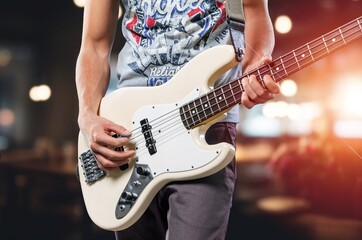 Young male Guitarist Playing a  Electric Guitar