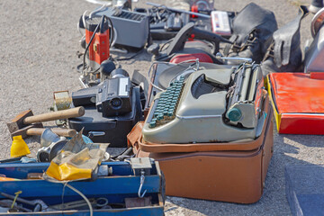 Obsolete Equipment Vintage Typewriter and Retro Camera for Sale at Flea Market
