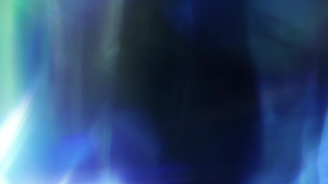 Blue Lights Flowing in the Breeze 4K Loop features an abstract video of multicolored blue lights flowing in a liquid like fashion in a loop.