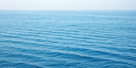 Fototapeta premium Blue striped background with a subtle pattern of waves or ripples, wave pattern, calming visuals