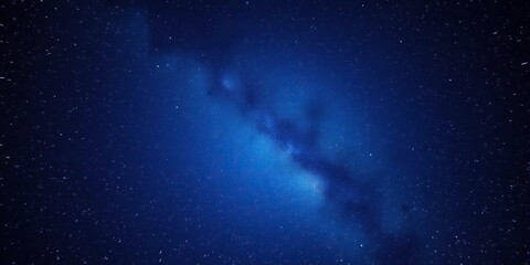 Fototapeta premium A stunning representation of the Milky Way galaxy against a deep blue background, starry night, cosmos