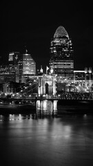 Cincinnati City Skyline Nightscape over the Ohio River, a retro-style black and white photo