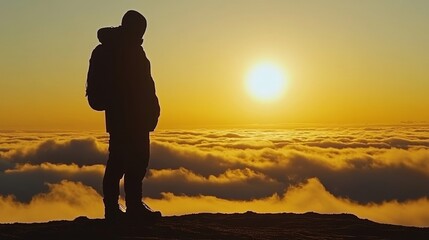 Fototapeta premium Adventurous Traveler Standing on a Mountain