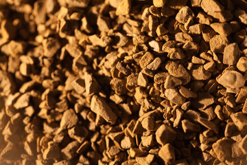 brown granules of black instant coffee