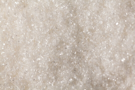 uneven texture of white granulated sugar