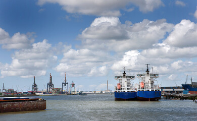 Waalhaven harbour at Rotterdam with boats and ships. Netherlands.