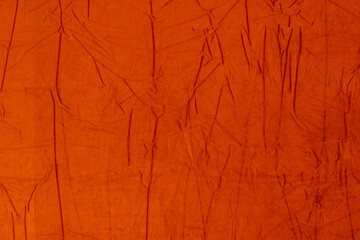 a red background with a pattern of branches and a red background.